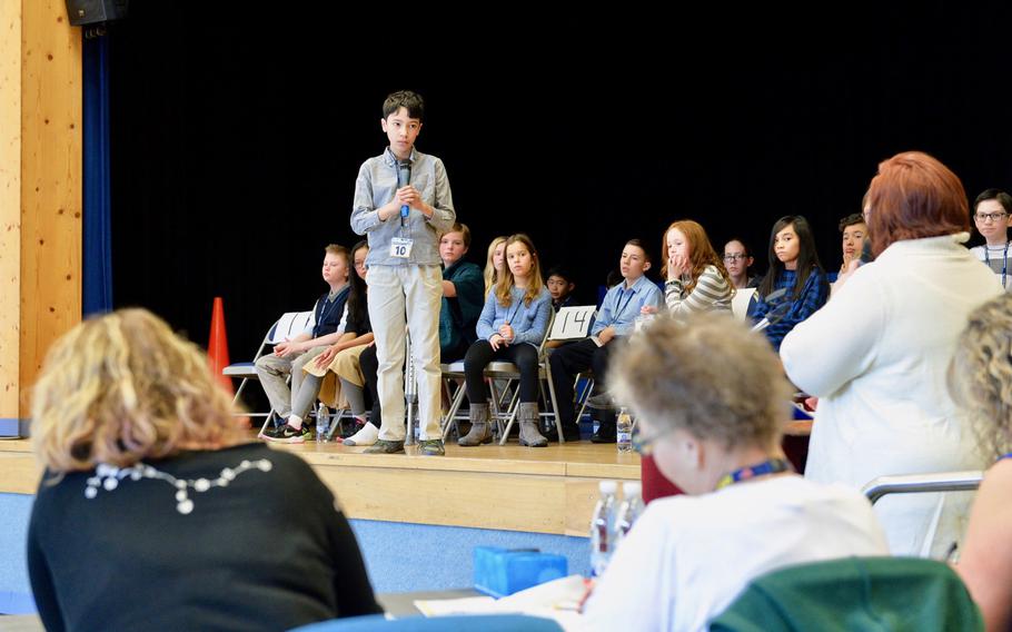 Nicholas Biega, a student at Landstuhl Elementary/Middle School listens to a judge answer a question about the history of a word Saturday, Feb. 23, 2019, during the 2019 European PTA Regional Spelling Bee.