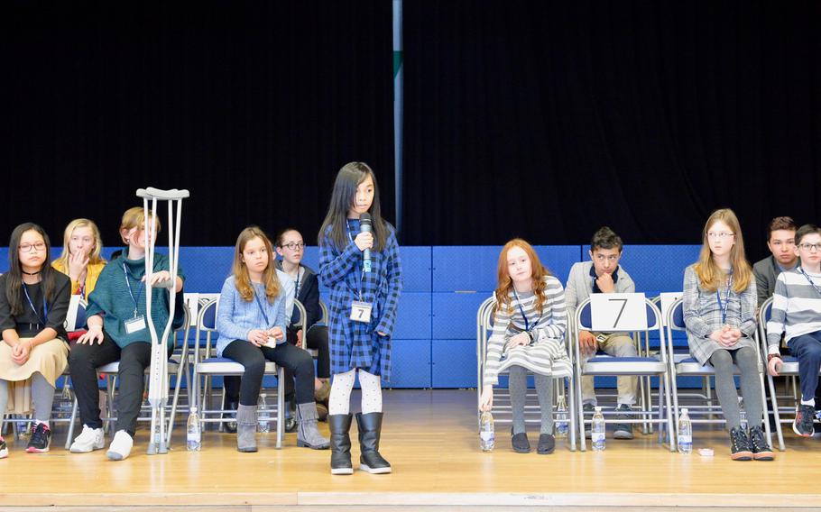 Khalista Talingdan of Hohenfels Elementary School spells out "transect" in the fifth round of the 2019 European PTA Regional Spelling Bee on Saturday Feb. 23, 2019. 