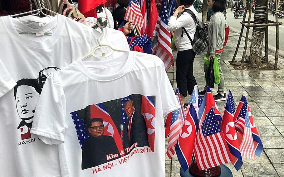 From T-shirts to flags, souvenirs capitalize on the summit between President Donald Trump and North Korean leader Kim Jong Un in Hanoi, Vietnam, Wednesday, Feb. 27, 2019.