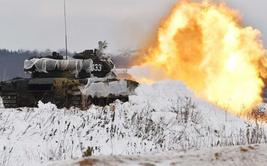 A Russian tank fires during a training exercise near Moscow. Russia reportedly will  beef up its Baltic Fleet with a tank regiment and a coastal defense missile battalion.