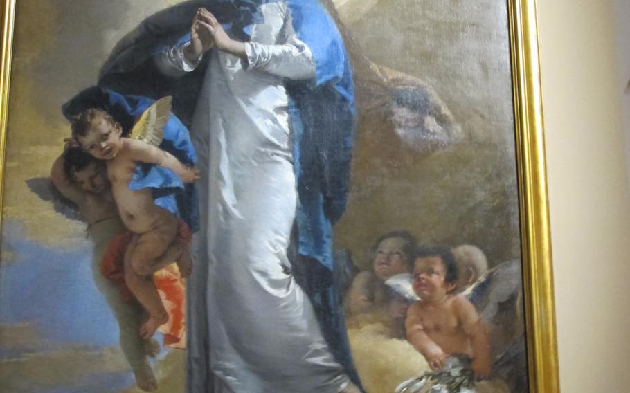 Tiepolo's "The Immaculate Conception," featuring the virgin Mary's perfect oval face, was painted for a Franciscan order that fervently supported the dogma of the Immaculate Conception. It is on display at the Palazzo Chiericati museum in Vicenza.