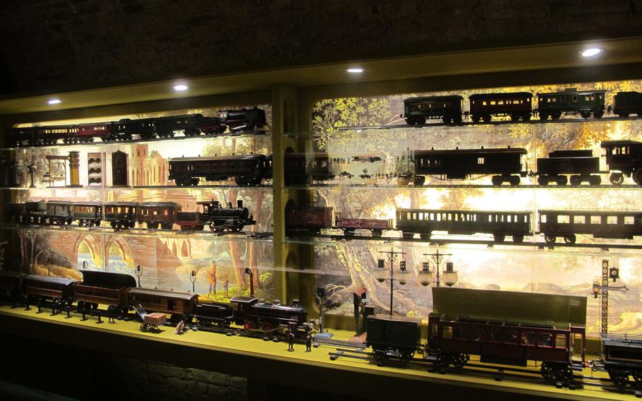 A roomful of toy trains, all in perfect working order and condition, is artfully lit. The trains a part of a massive collection of antique toys at the Palazzo Chiericati museum in Vicenza.