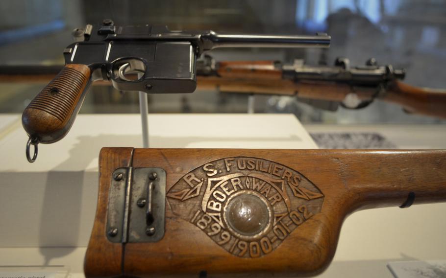 A German Mauser C96 "Broomhandle" from about 1899 on display in the War gallery at the Leeds Royal Armouries Museum in Leeds, England. The automatic pistol had a magazine capacity of 10 rounds and a range of more than 500 meters.