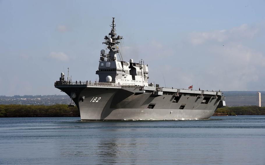 The Japan Maritime Self-Defense Force destroyer helicopter ship JS Ise departs Pearl Harbor, Hawaii, July 10, 2018. Japan plans to build smaller vessels to relieve its destroyers of patrol duties in the East China Sea.