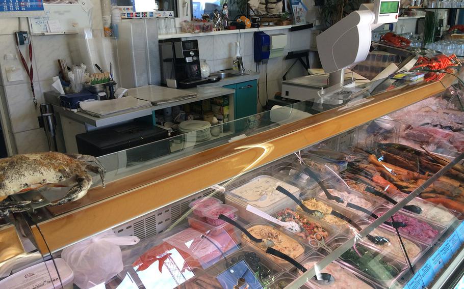 The counter at Fisch Schira includes sandwiches, side dishes and, of course, fresh fish filets.