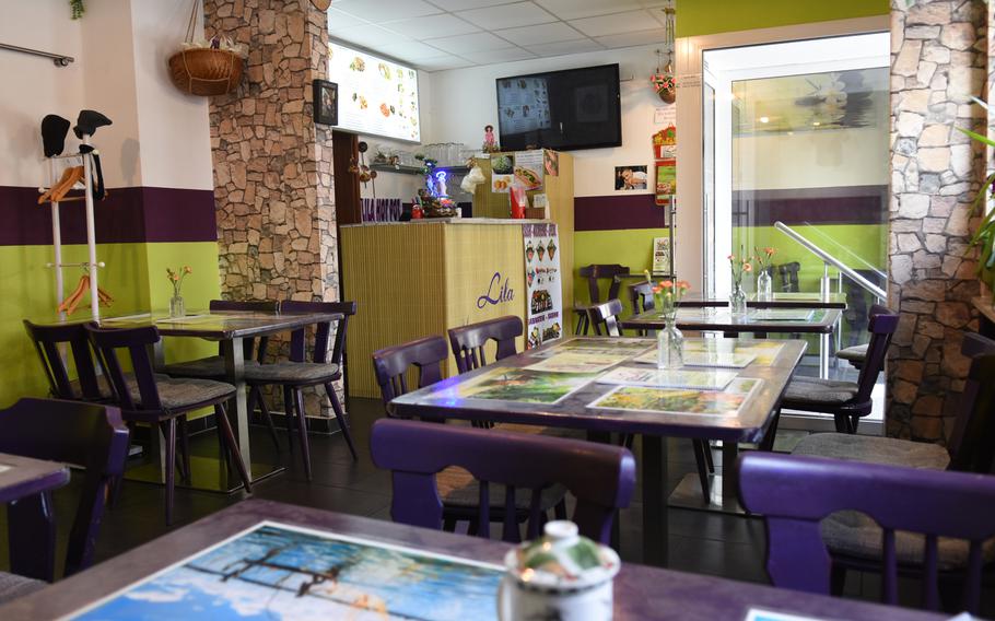 The inside of Lila South Vietnamese Specialties, a restaurant in downtown Kaiserslautern, Germany, is small but cheerful and clean, with freshly-cut flowers and Asian decor brightening the cozy dining room.