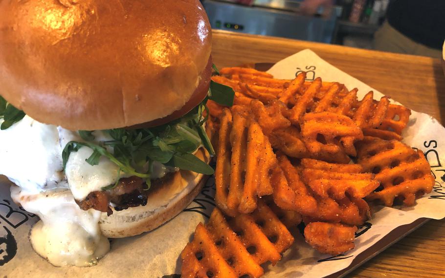 Mr. B's Greek burger mixes the flavors of a freshly cooked burger and the tastes of a gyro, perfectly balanced with feta cheese, tzatziki sauce and bacon. Slightly messy, doubly delicious.