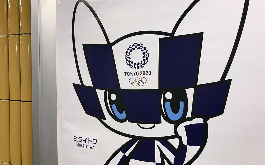 A poster advertising the 2020 Summer Olympics is seen inside a Tokyo subway station in 2019. 