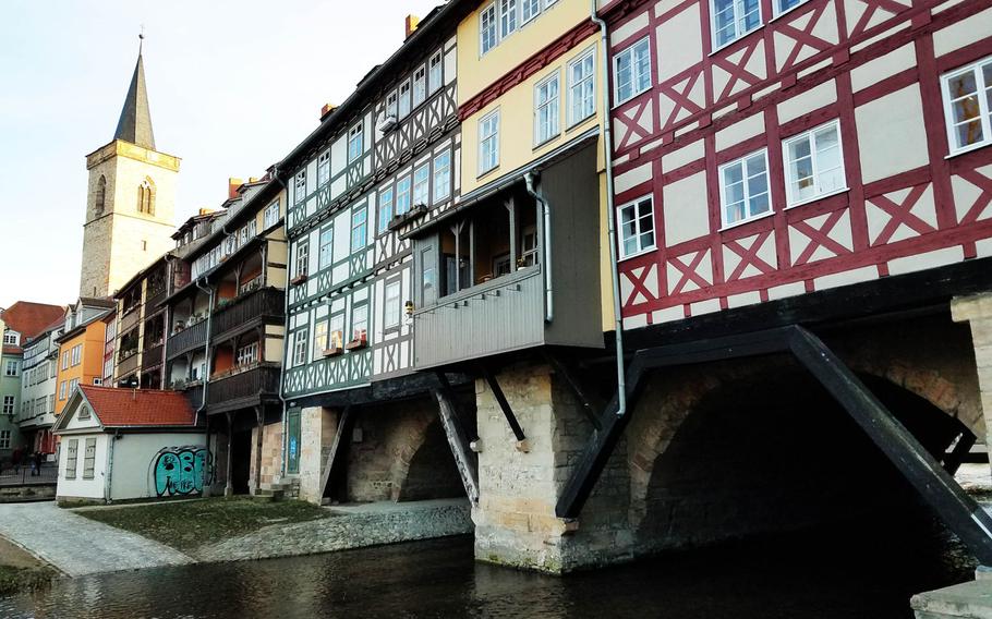 The Merchant's Bridge in Erfurt lined with houses and shops. The bridge is one of the last inhabited bridges left in the world.