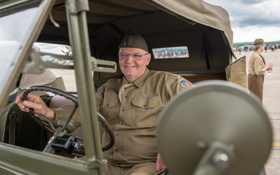 Rene Stadler sits in a Dodge WC56, known as the command car, during the 70th anniversary commemoration of the end of the Berlin Airlift at Clay Kaserne airfield, Monday, June 10, 2019. 