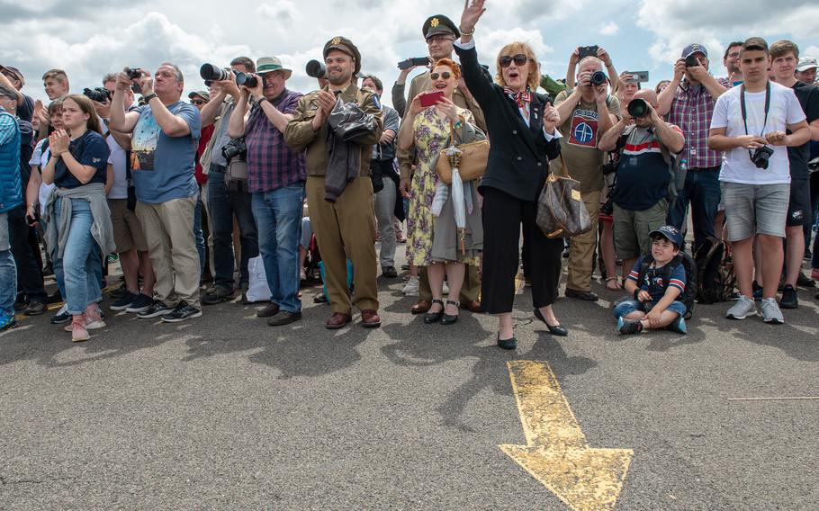 Vera Mitschrich, a Berlin Airlift witness, waves as retired Col. Gail Halvorsen, the candy bomber, arrives at the 70th anniversary commemoration of the end of the Berlin Airlift at Clay Kaserne airfield, Monday, June 10, 2019. 