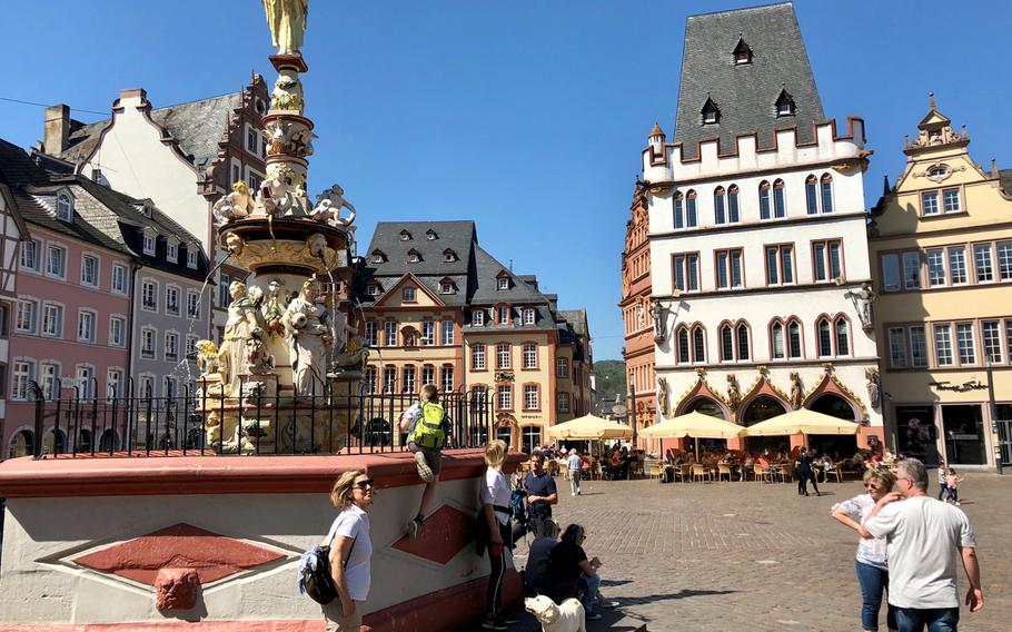 Trier's central marketplace, or Hauptmarkt, with its colorful assembly of ornate buildings.