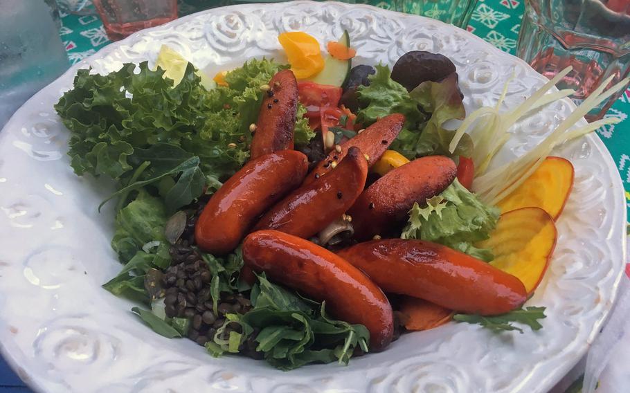 The menu at Ins Blaue in Stutgart isn't extensive, but the meals are creative. Among the offerings are a stew of lentils and sausages with tasty spices, watermelon salad and chicken served in a peanut sauce.
