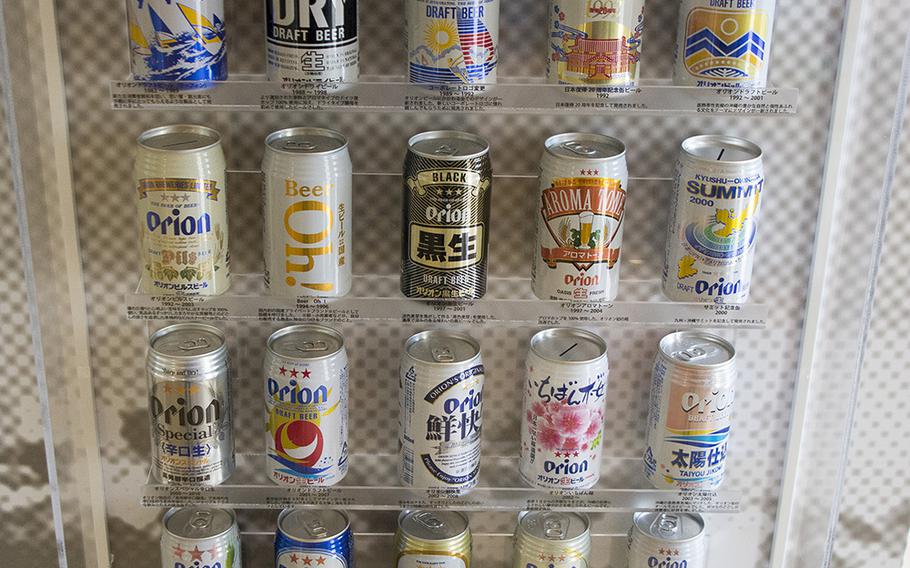 Orion beer cans are displayed during a tour of Orion Happy Park in Nago, Okinawa, Aug. 14, 2019.