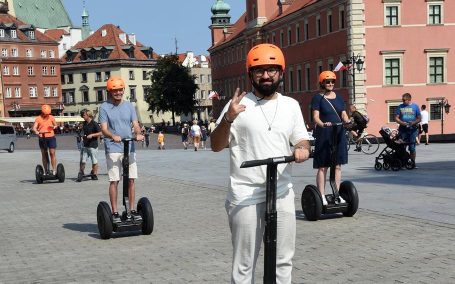 Tourists take a segway tour of Warsaw, Poland, on Sept. 1, 2019. Guided tours in English on bicycles as well as walking tours are also advertised.