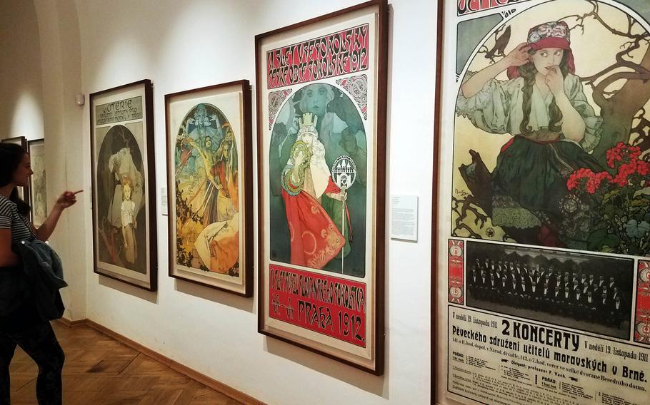 Several posters by Alphonse Mucha inside the Mucha Museum in Prague, Czech Republic. Mucha is best known for his art nouveau, stylized theater posters.