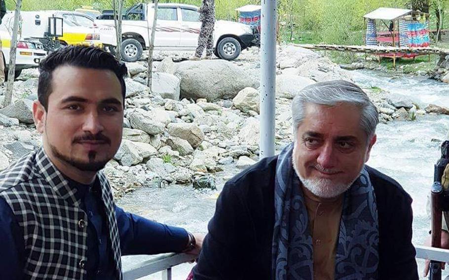 Jehanzib Omar Zakhilwal (left) shown here posing with Afghan CEO Abdullah Abdullah, was killed by a CIA-backed paramilitary group in September. Immediately after the killing, Afghan intelligence officials said Zakhilwal and his three brothers, who were also killed,  belonged to the Islamic State group.