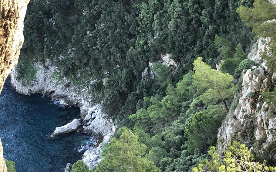 Peering through Arco Naturale's opening, you see the blue waves lapping the foot of Capri's verdant hillsides.