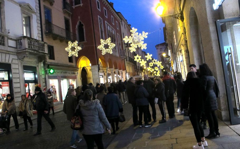 Vicenza's pedestrian friendly old town is lit with lights and shoppers throughout the winter holidays.