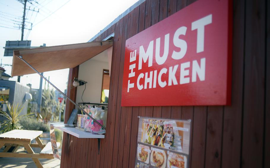 The Must Chicken at Delta East in Fussa, Japan, serves a variety of chicken-over-rice dishes, including the popular cheddar and basil flavor.
