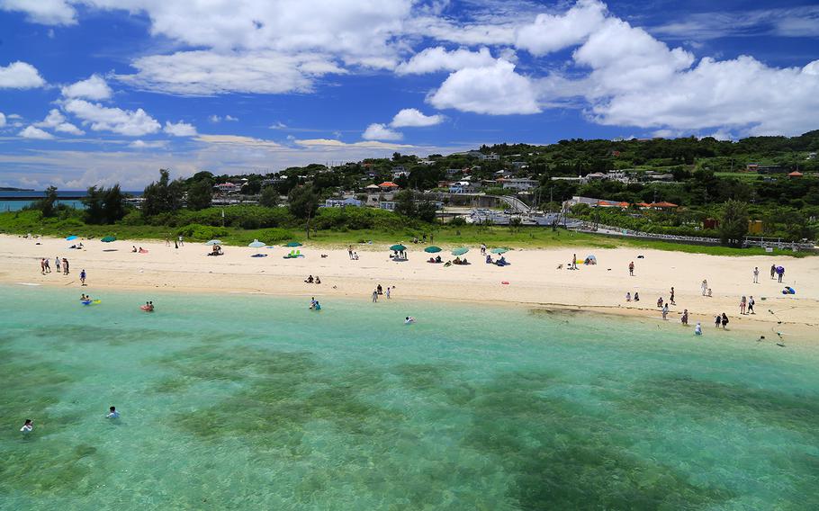 Kouri Beach, a popular swimming spot on Kouri Island, Okinawa, boasts shallow water suitable for families with small children.