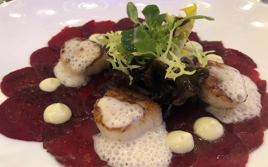 Red beet carpaccio with wasabi and roasted scallops is a delicious starter at Hotel Monika's restaurant in Buettelborn, Germany.