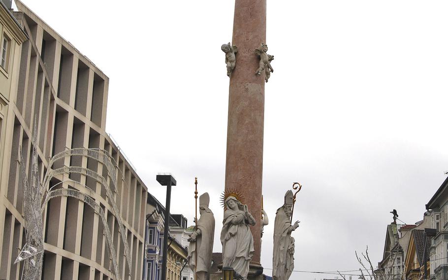 St. Anne's Column, located in Innsbruck's city center, is made of red marble and topped by a statue of the Virgin Mary.