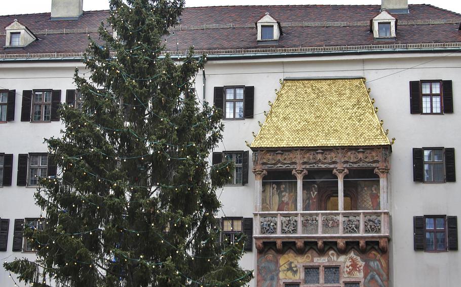 The Golden Roof, located in Innsbruck's city center, is a canopy entirely built of golden shingles that is believed to have been built by Emperor Maximilian I. He is said to have sat under the golden canopy and watched the festivities celebrating his assumption of rule over Tyrol, around 1490.