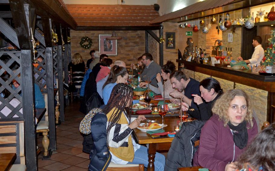 The Hacienda Mexican Restaurant in Wiesbaden, Germany offers table service with a bar.