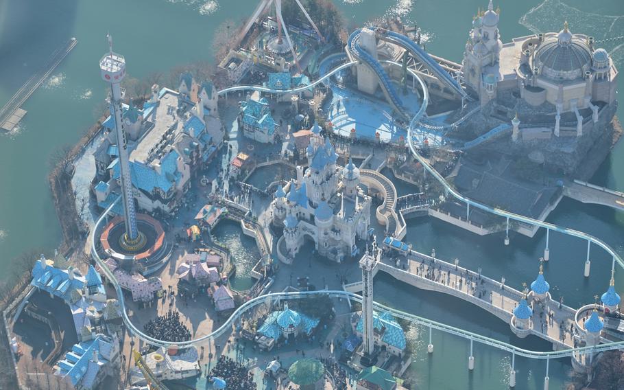 The Lotte World theme park looks like a child's playset from Lotte World Tower's Seoul Sky observation deck in Seoul, South Korea.