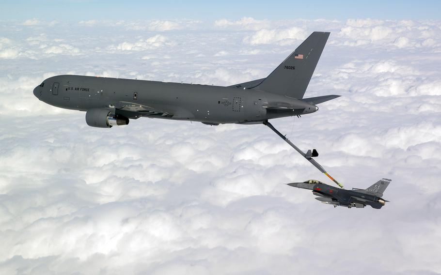 A U.S. Air Force  F-16 receives fuel from a KC-46 Pegasus, the service's new tanker, during a mission over Florida, Dec. 12, 2019.