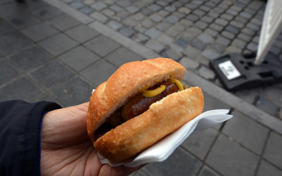 ''Three in a bun'' bratwurst is popular street food in Nuremberg, Germany, but a sit-down meal with bratwurst, sauerkraut and potato salad is a more complete experience.