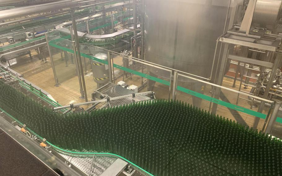 The modern bottling hall at the Pilsner Urquell brewery in Pilsen, Czech Republic, has the capacity to fill 120,000 bottles of beer per hour.