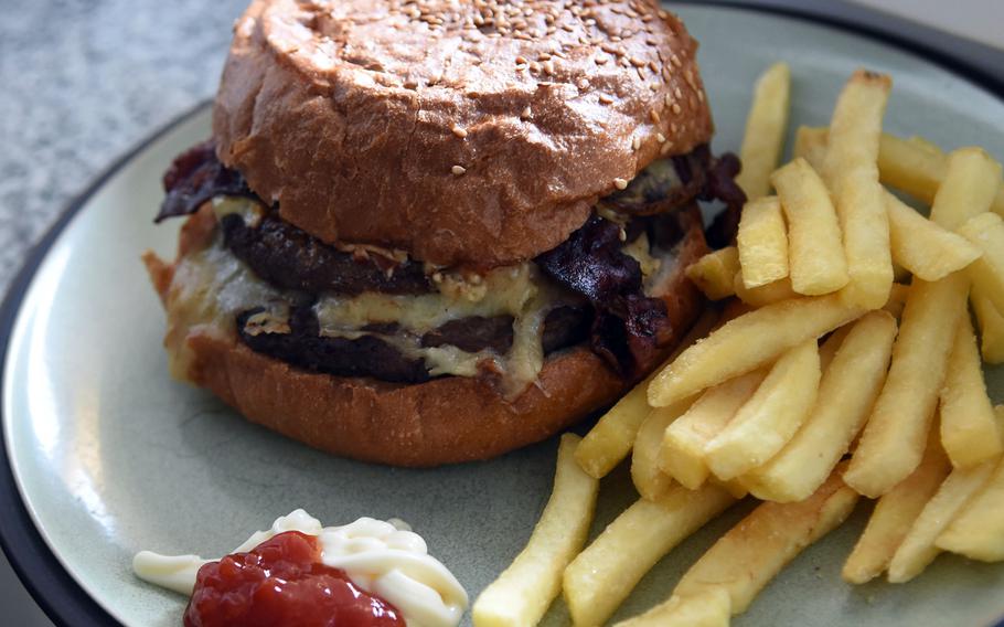 A Burtonburger from Neil's Pub in Mackenbach, Germany, available for takeout, can satisfy a hearty appetite with its two beef patties and generous toppings.