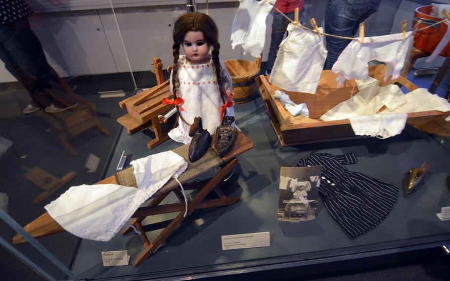 Some toys for girls from the first decade of the 1900s, including this doll ironing and doing laundry, drive home just how much the concept of playtime has changed over the years. The doll is part of the permanent exhibit at the Nuremberg Toy Museum in Germany.