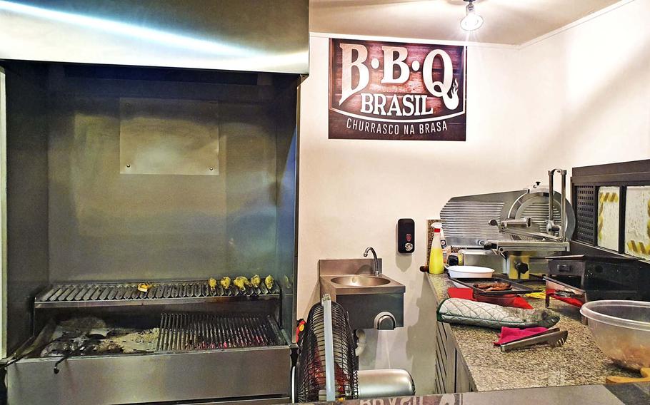 Boom Brasil's wood-burning grill, the key to Brazilian flavor. Churrasco is the signature method used to barbecue the meats the restaurant has on its menu. The restaurant opened at the beginning of June and is about 11 miles from Aviano Air Base.