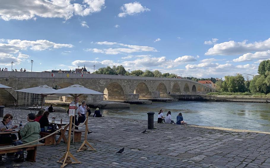 The historic Steinerne Bruecke, or Stone Bridge, in Regensburg, Germany, July 7, 2020. The bridge, which dates back to the 12th century, provides tranquil views of much of the city.