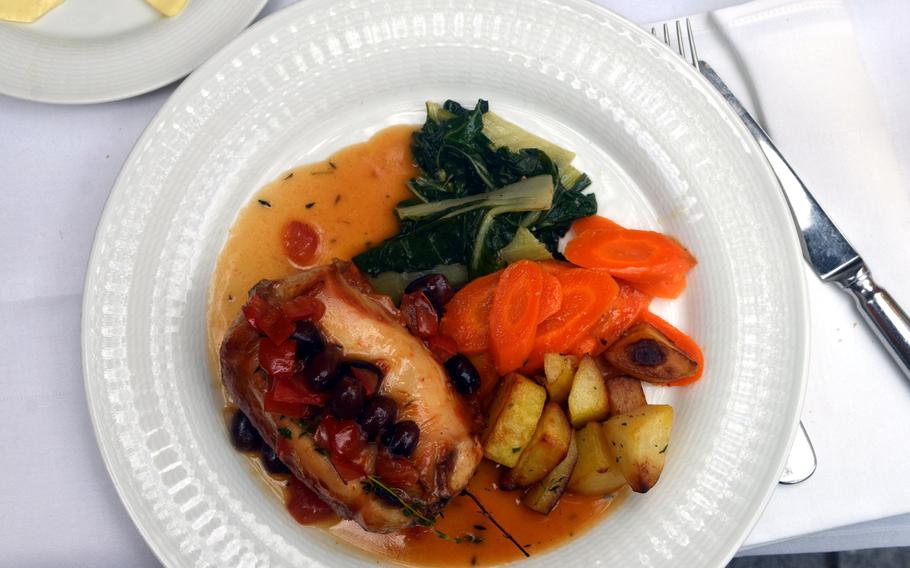 A rack of rabbit with white wine sauce, black olives and thyme at Gregorelli's in Frankfurt, Germany. The entree also came with spinach, carrots and roasted potatoes.
