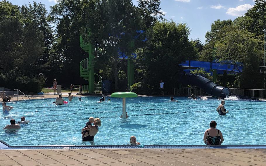 There is a dedicated shallow family pool with a large slide at the Trippstadt pool in Germany.