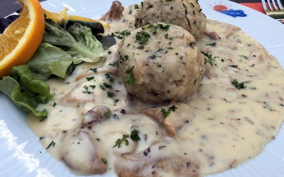 A seasonal specialty, chanterelle mushrooms in a herbed cream sauce over dumplings at the Licht-Luft restaurant in Kaiserslautern, Germany.