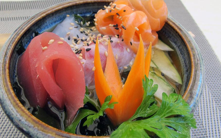 At Furai Japanese Restaurant in Vicenza, the kaisen sunomono - salmon, tuna, white fish, cucumber, seaweed and sesame seeds in rice vinegar - is colorful, low in calories, and high in protein and vitamin A. Even the sweet, crisp carrot garnish was delicious.