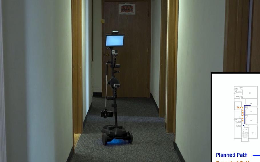 A ''telepresence robot" with cameras and sensors conducts a sweep of an office building on July 31, 2020, in a video produced for the Air Force Research Laboratory's 711th Human Performance Wing's studies on human trust interactions with robots, at Wright-Patterson Air Force Base in Dayton, Ohio.
