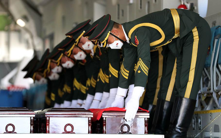 South Korea returned 117 sets of remains of Chinese soldiers killed in the Korean War during a ceremony at Incheon International Airport near Seoul, South Korea, Sunday, Sept. 27, 2020.