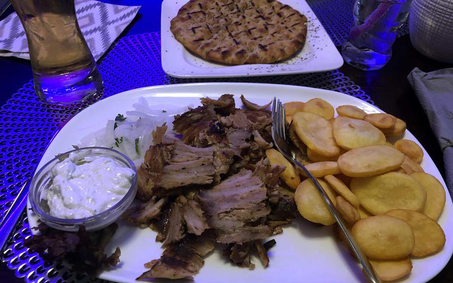 The gyros at Asteria in Kaiserslautern, Germany, come with tzatziki, a side dish and a salad.