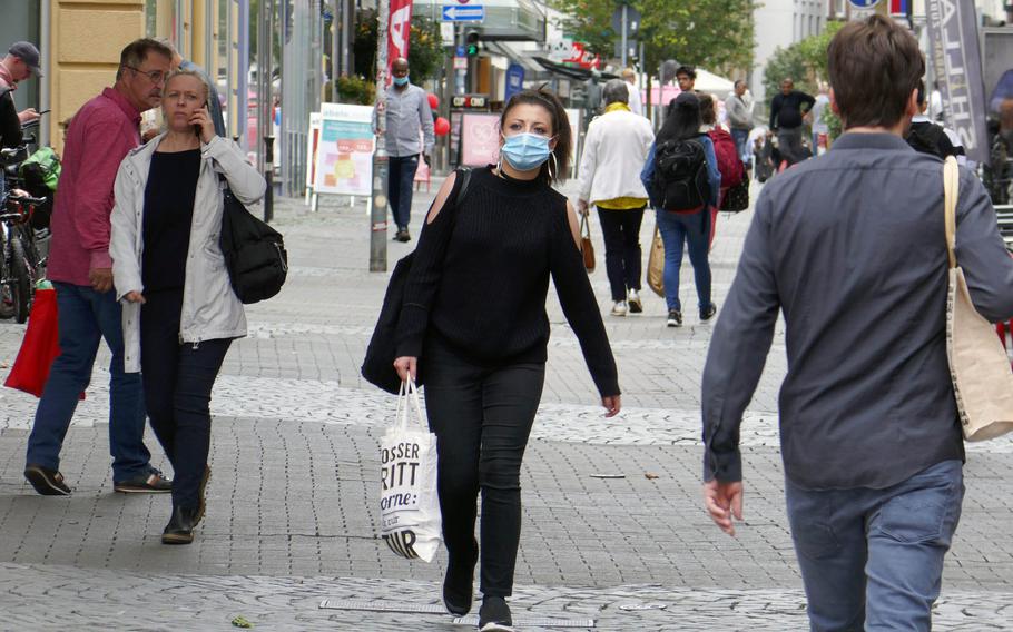 People walk down Marktstrasse in downtown Kaiserslautern, Germany in late August 2020. A spike in coronavirus cases in Kaiserslautern led health officials to raise the health alert for the city to the second-highest level on Oct. 9, 2020.