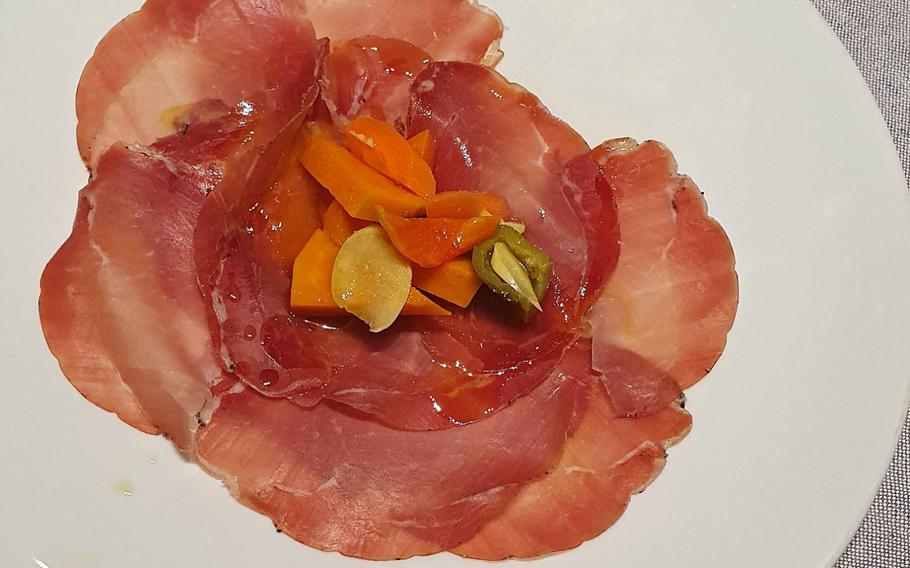 Fiocco di Sauri is a lean and mild-tasting ham that is lightly smoked and refined with aromatic herbs. It comes from Sauris, a mountain village in the middle of the Dolomites in the Friuli Venezia Giulia region of Italy, and is served at the Bar Trattoria Cavour in Sacile.