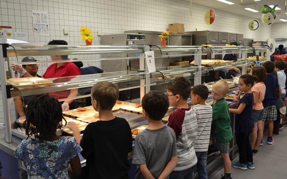 Students line up for lunch at Netzaberg Elementary School, Germany, in 2016. The Department of Defense Education Activity will provide free lunches to all overseas students beginning Nov. 2, 2020.



