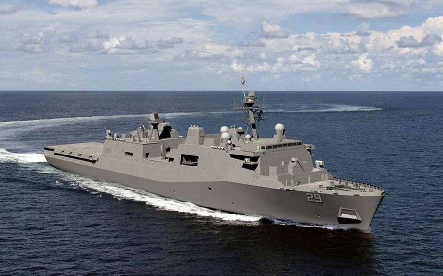 A rendering of the USS Richard M. McCool Jr. LPD 29 lifted off the floating dry dock as Ingalls Shipbuilding launched the latest in its line of amphibious assault transport ships last week.