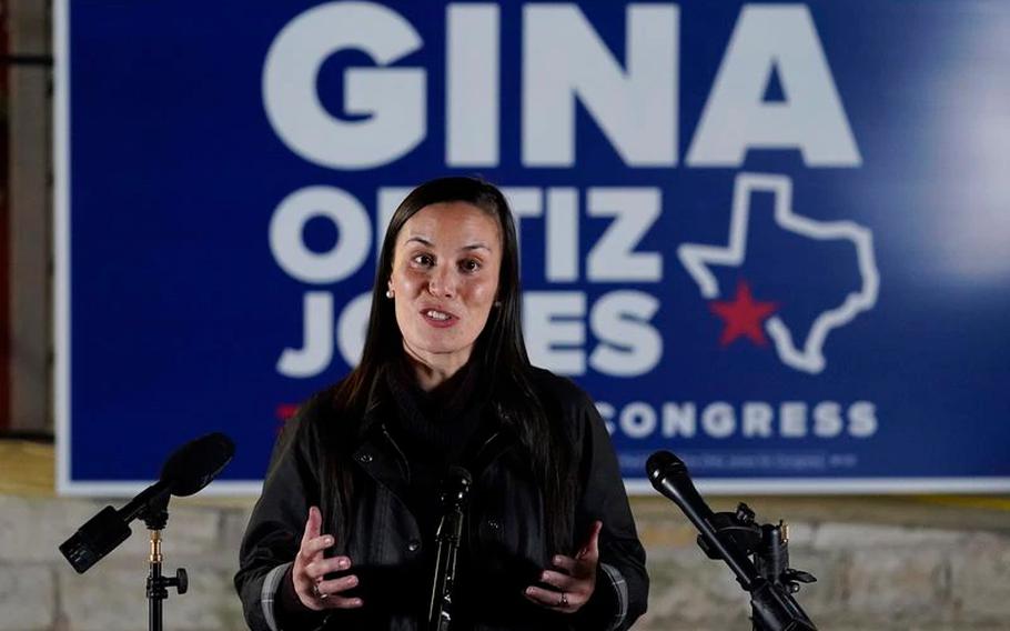 Democratic congressional candidate Gina Ortiz Jones talks with the media outside of her campaign headquarters, Tuesday, Nov. 3, 2020, in San Antonio. 