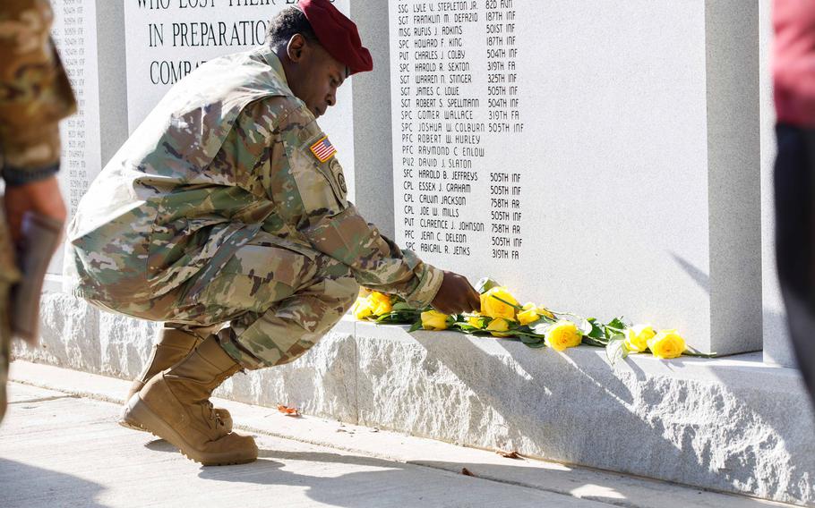 Soldiers participate in a ceremony honoring eight paratroopers killed in combat or training accidents at Fort Bragg on Nov. 18, 2021. The names of the paratrooper were added to memorial walls during the event.